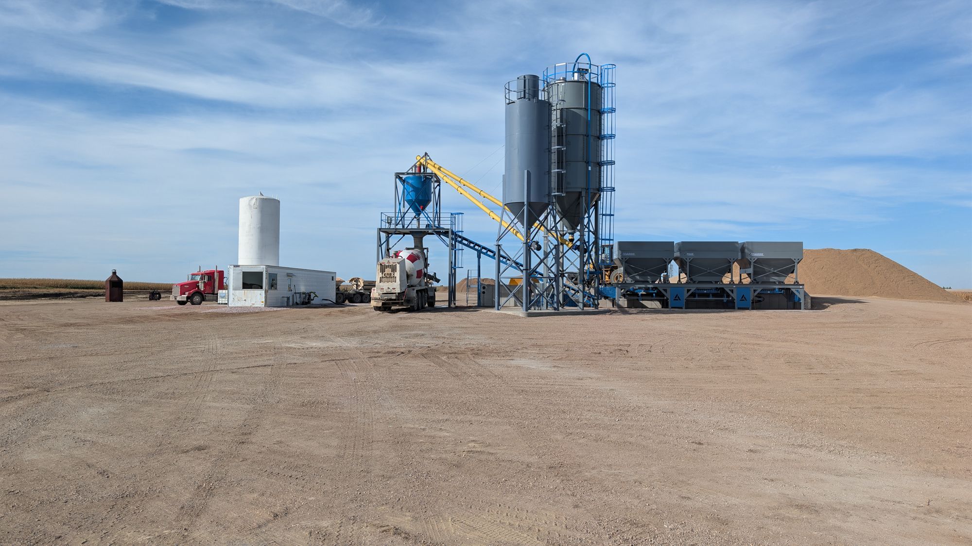 Mixer truck under the plant load hopper.